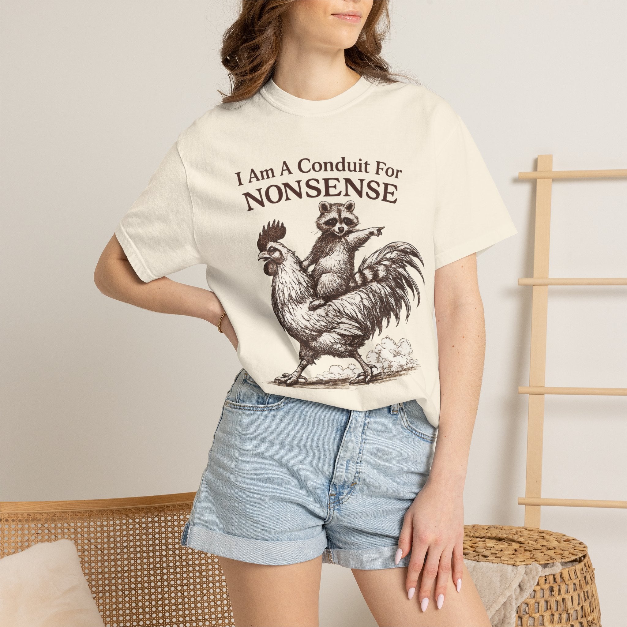 I Am a Conduit for Nonsense T-Shirt — Raccoon Riding Rooster Vintage Graphic Tee