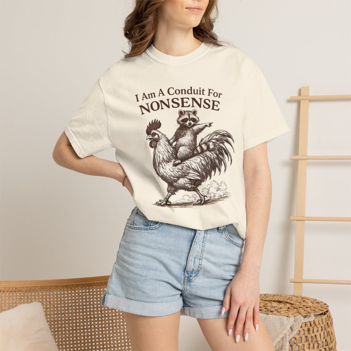 I Am a Conduit for Nonsense T-Shirt — Raccoon Riding Rooster Vintage Graphic Tee