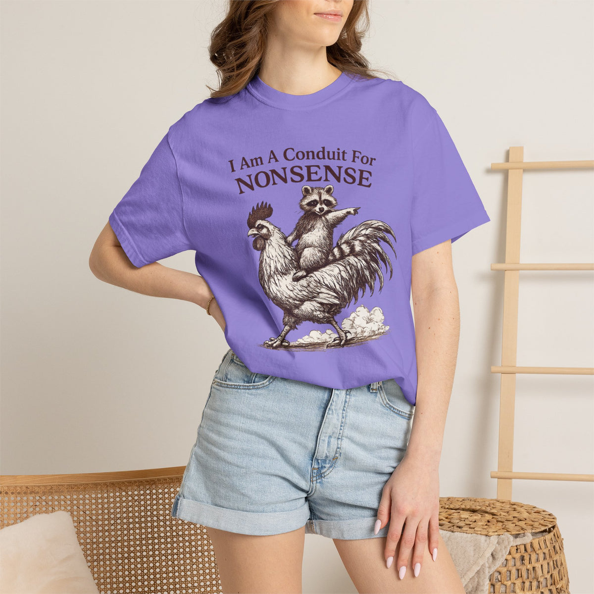 I Am a Conduit for Nonsense T-Shirt — Raccoon Riding Rooster Vintage Graphic Tee