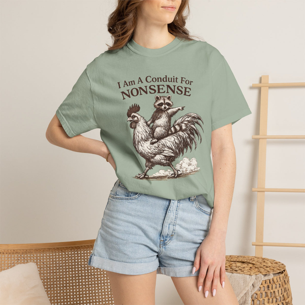 I Am a Conduit for Nonsense T-Shirt — Raccoon Riding Rooster Vintage Graphic Tee